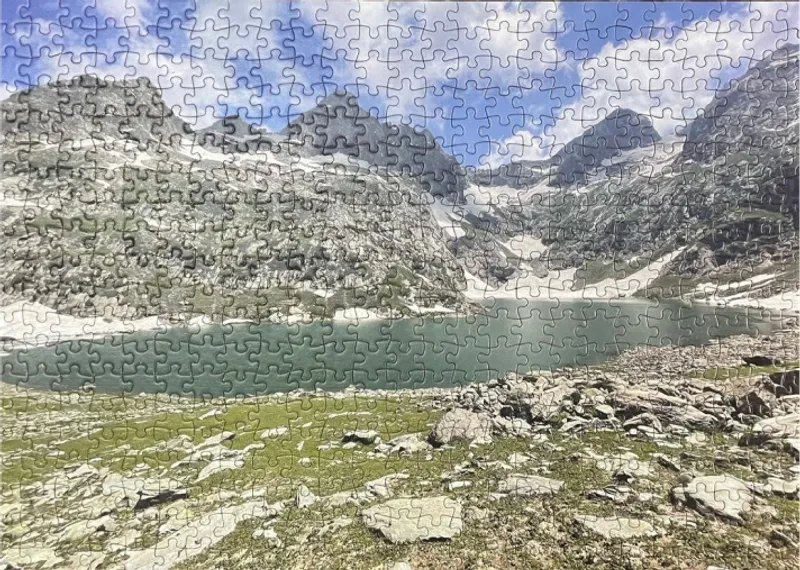 A finished custom photo puzzle of a mountain lake