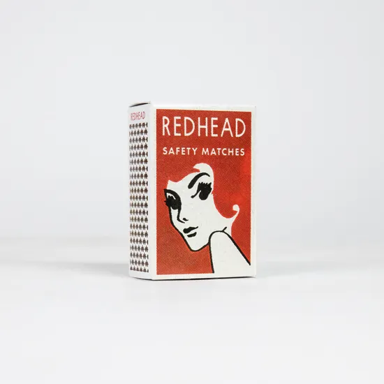 Redhead - A 150 Piece Matchbox Jigsaw Puzzle by Murtaza M. Bookwala - Image 1