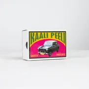 Kaali Peeli - A 150 Piece Matchbox Jigsaw Puzzle by Murtaza M. Bookwala - Thumbnail Image